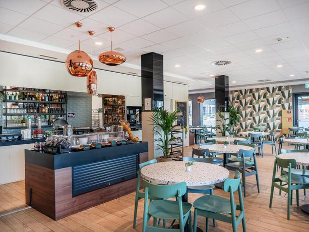 Imagen del bar/restaurante del Hotel B&B Z&uuml;rich Airport R&uuml;mlang. Foto 3