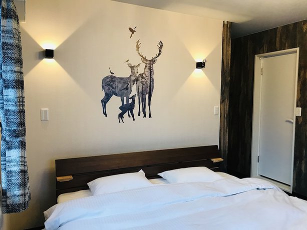 Imagen de la habitación del Hotel B&B plus+ Shooting Star. Foto 17