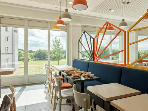 Imagen del bar/restaurante del Hotel B&B près de Disneyland Paris. Foto 4