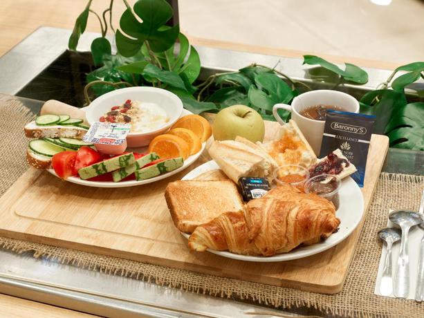 Imagen del bar/restaurante del Hotel B&B pr&egrave;s de Disneyland Paris. Foto 6