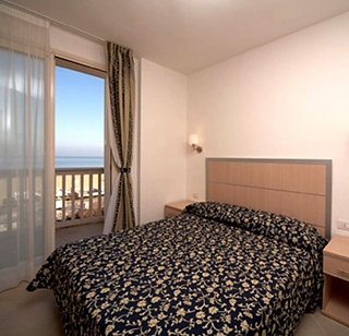 Imagen de la habitación del Hotel B&H Residence Paradiso. Foto 3