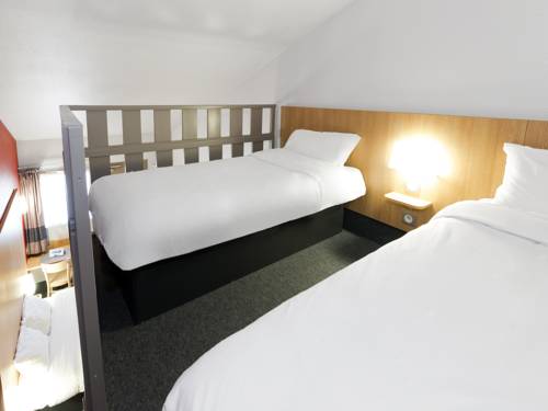 Imagen de la habitación del Hotel B&b H&ocirc;tel Quimper Nord Douarnenez. Foto 6