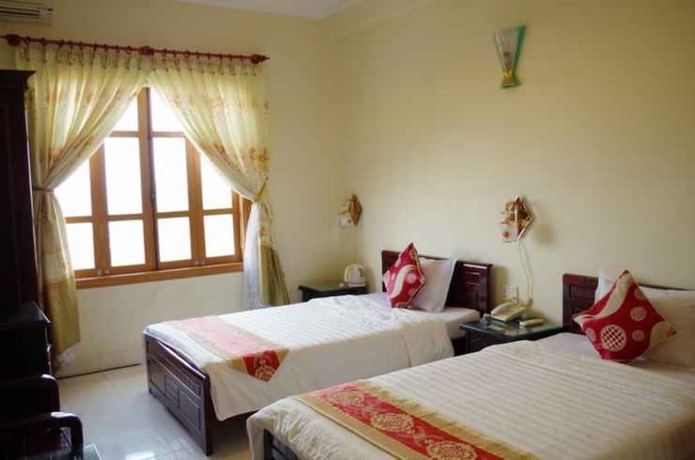 Imagen de la habitación del Hotel Ban Mai Quang Binh. Foto 16