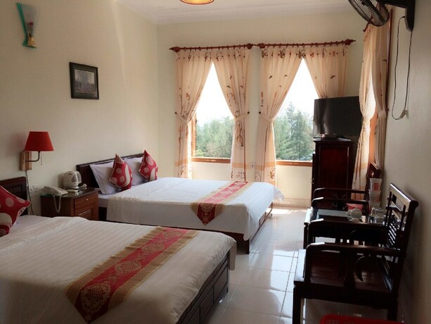 Imagen de la habitación del Hotel Ban Mai Quang Binh. Foto 22