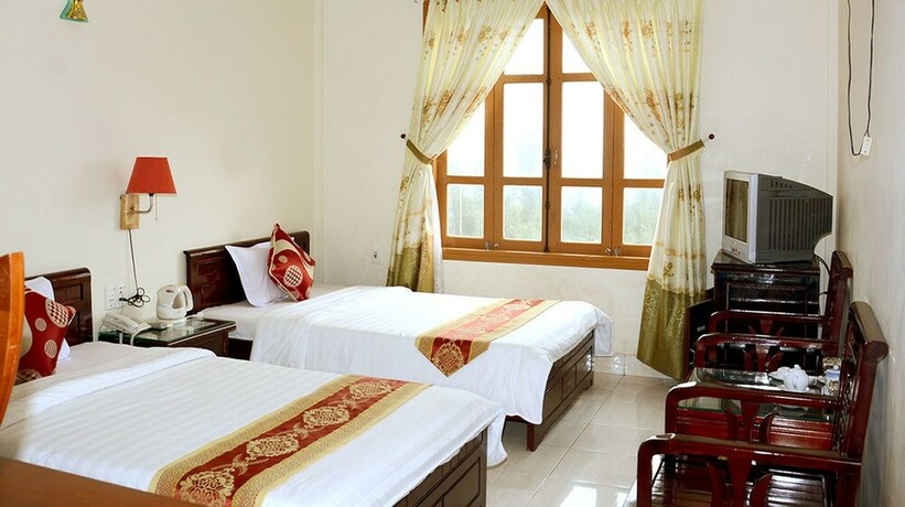 Imagen de la habitación del Hotel Ban Mai Quang Binh. Foto 23