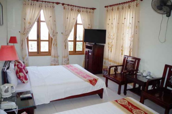 Imagen de la habitación del Hotel Ban Mai Quang Binh. Foto 26