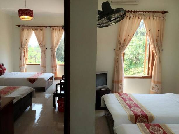 Imagen de la habitación del Hotel Ban Mai Quang Binh. Foto 33