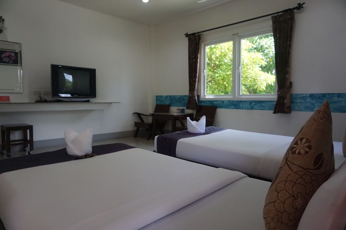 Imagen de la habitación del Hotel Ban Pak Chaytung Trang. Foto 9