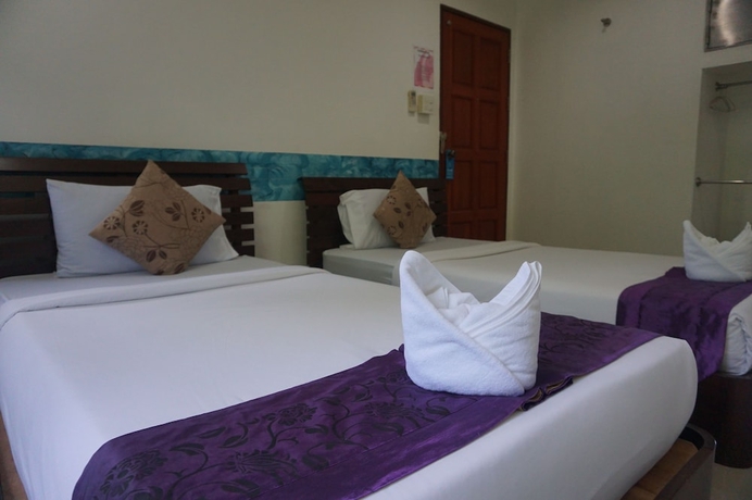 Imagen de la habitación del Hotel Ban Pak Chaytung Trang. Foto 11