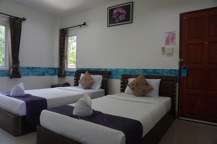Imagen de la habitación del Hotel Ban Pak Chaytung Trang. Foto 15
