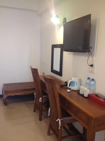 Imagen de la habitación del Hotel Ban Phraya Lanna. Foto 12