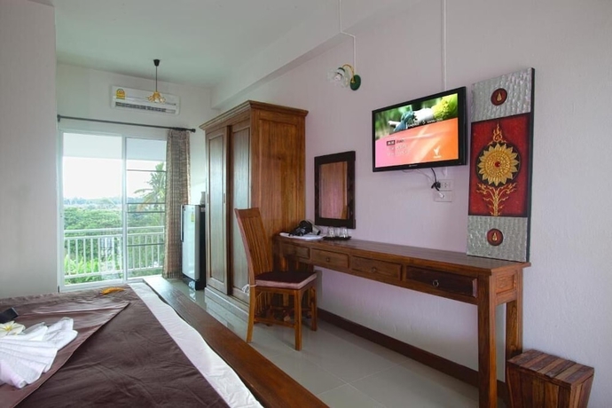 Imagen de la habitación del Hotel Ban Phraya Lanna. Foto 16