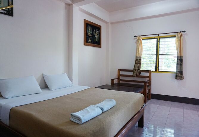 Imagen de la habitación del Hotel Ban Poh Garden House. Foto 19