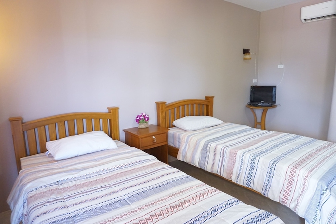 Imagen de la habitación del Hotel Ban Rai Nai Suan. Foto 7