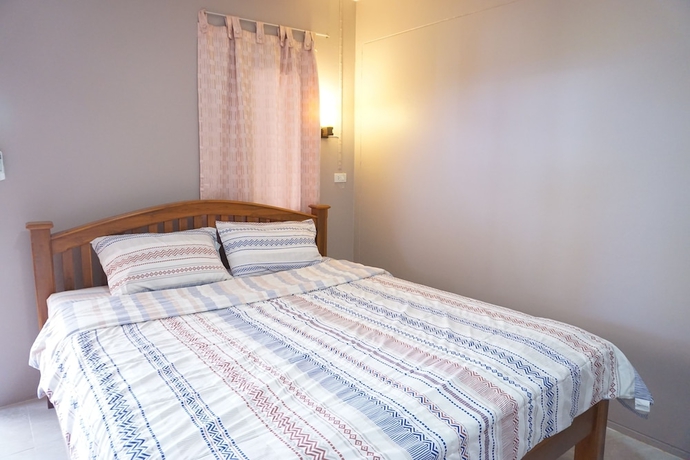 Imagen de la habitación del Hotel Ban Rai Nai Suan. Foto 9