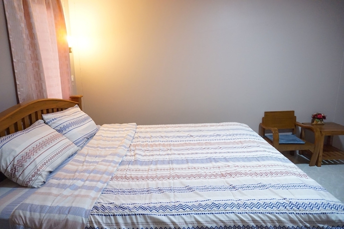 Imagen de la habitación del Hotel Ban Rai Nai Suan. Foto 10