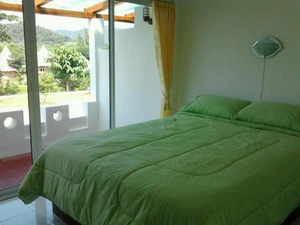 Imagen de la habitación del Hotel Ban Rai Pornsawan. Foto 8
