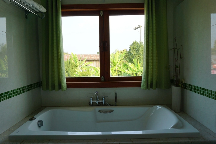 Imagen de la habitación del Hotel Ban Rim Nam Riverside Resort. Foto 2