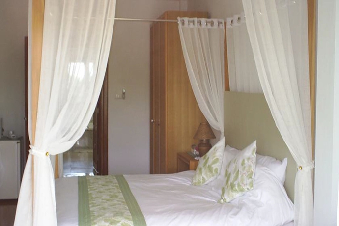 Imagen de la habitación del Hotel Ban Rim Nam Riverside Resort. Foto 3