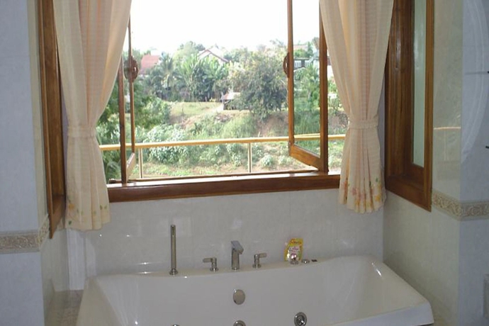 Imagen de la habitación del Hotel Ban Rim Nam Riverside Resort. Foto 8