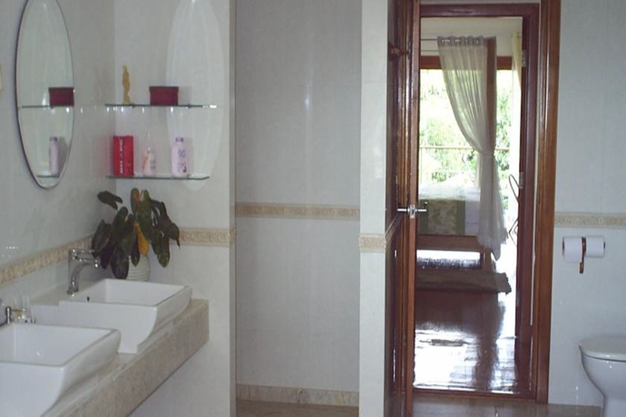 Imagen de la habitación del Hotel Ban Rim Nam Riverside Resort. Foto 10