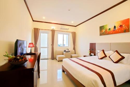 Imagen de la habitación del Hotel Ban Thach Riverside & Resort. Foto 6