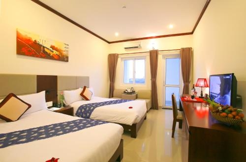 Imagen de la habitación del Hotel Ban Thach Riverside & Resort. Foto 7