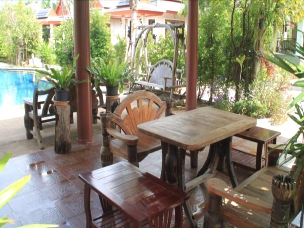 Imagen de la habitación del Hotel Ban Thaithip Resort. Foto 7