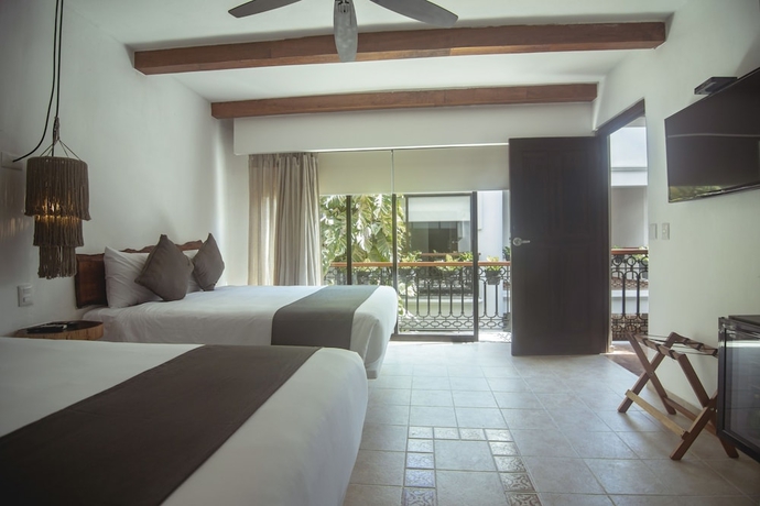Imagen de la habitación del Hotel Banana Boutique By Voila es - 5th Av Playa Del Carmen. Foto 4