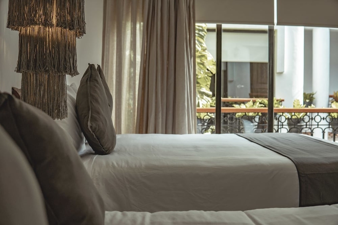 Imagen de la habitación del Hotel Banana Boutique By Voila es - 5th Av Playa Del Carmen. Foto 10