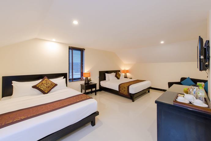 Imagen de la habitación del Hotel Banana Garden Villa. Foto 18