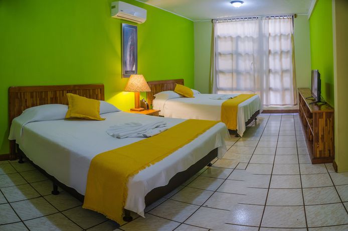 Imagen de la habitación del Hotel Banana Palms. Foto 8