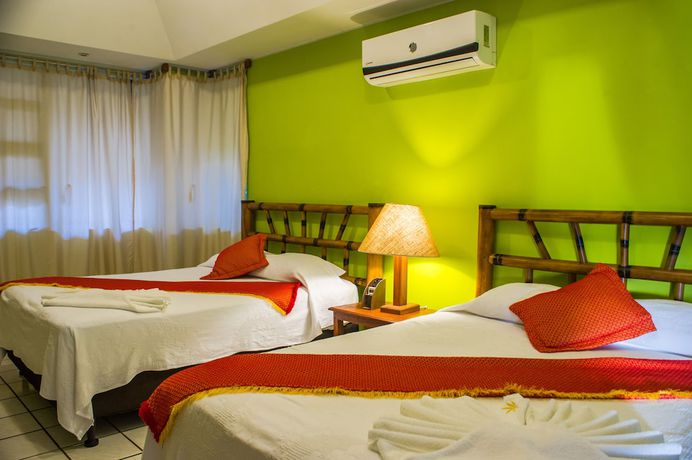 Imagen de la habitación del Hotel Banana Palms. Foto 15