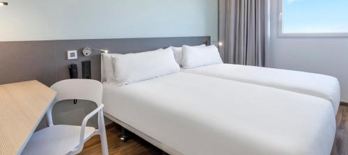 Imagen de la habitación del Hotel BandB MADRID Carabanchel. Foto 11