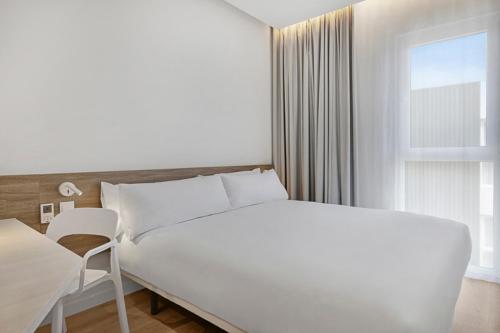 Imagen de la habitación del Hotel BandB MADRID Carabanchel. Foto 12