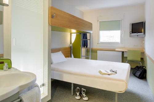 Imagen de la habitación del Hotel BandB Mannheim-Friedrichsfeld. Foto 10