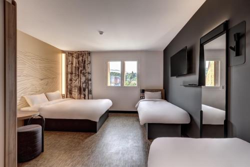 Imagen de la habitación del Hotel BandB Rennes Parc Expo Aéroport. Foto 9