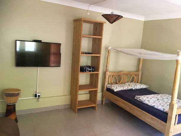 Imagen de la habitación del Hotel Banda Lodge. Foto 13