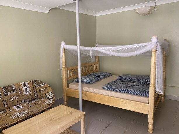 Imagen de la habitación del Hotel Banda Lodge. Foto 17