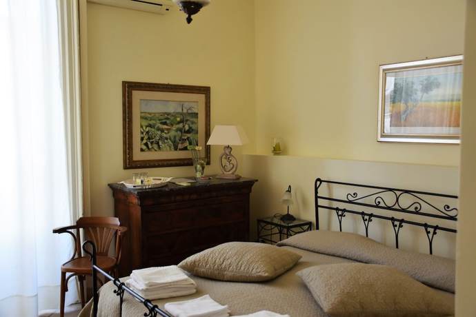 Imagen de la habitación del Hotel Bandb Al Teatro Massimo. Foto 4