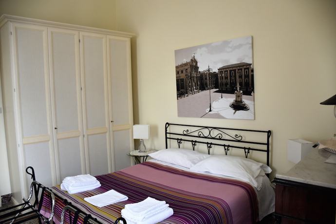 Imagen de la habitación del Hotel Bandb Al Teatro Massimo. Foto 15