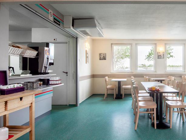 Imagen del bar/restaurante del Hotel Bandb Goussainville Cdg. Foto 2