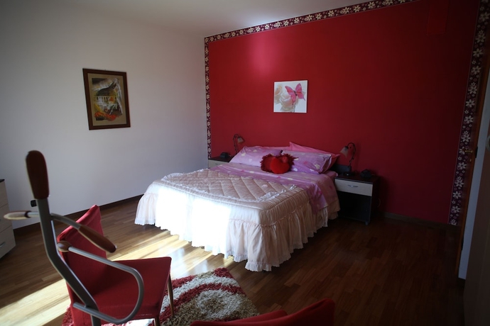 Imagen de la habitación del Hotel Bandb Mariposa. Foto 6