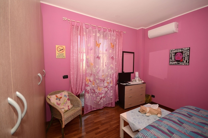 Imagen de la habitación del Hotel Bandb Mariposa. Foto 17