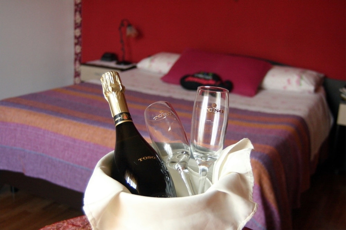 Imagen de la habitación del Hotel Bandb Mariposa. Foto 18