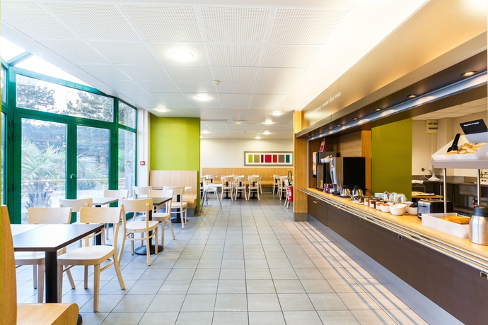 Imagen del bar/restaurante del Hotel Bandb Orly Rungis Aéroport. Foto 3