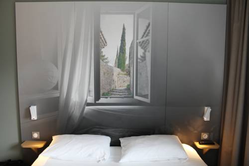 Imagen de la habitación del Hotel Bandb Valence Tgv-romans. Foto 15