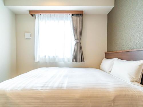 Imagen de la habitación del Hotel Bande Hotel Tenpozan Higashi. Foto 5