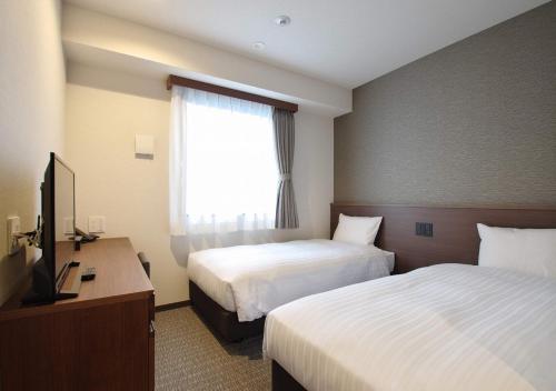 Imagen de la habitación del Hotel Bande Hotel Tenpozan Higashi. Foto 6