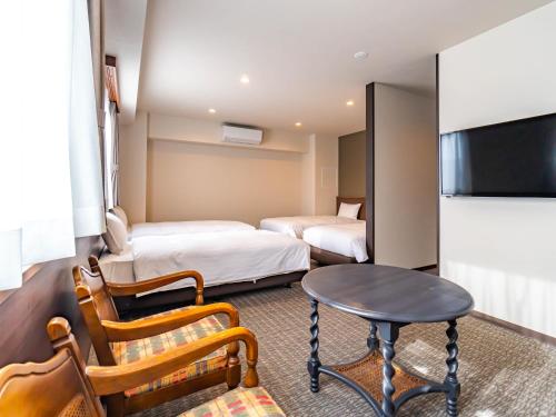 Imagen de la habitación del Hotel Bande Hotel Tenpozan Higashi. Foto 8